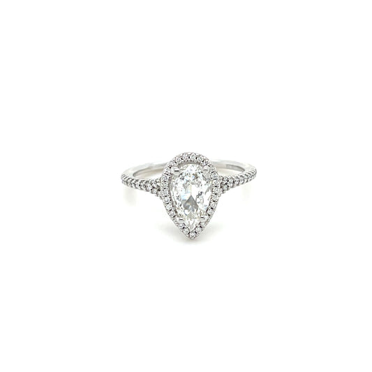 0.77 CT Pear Shape Center Stone with 0.31 CT Round Brilliant Cut Diamonds in a 14 KT White Gold Engagement Ring