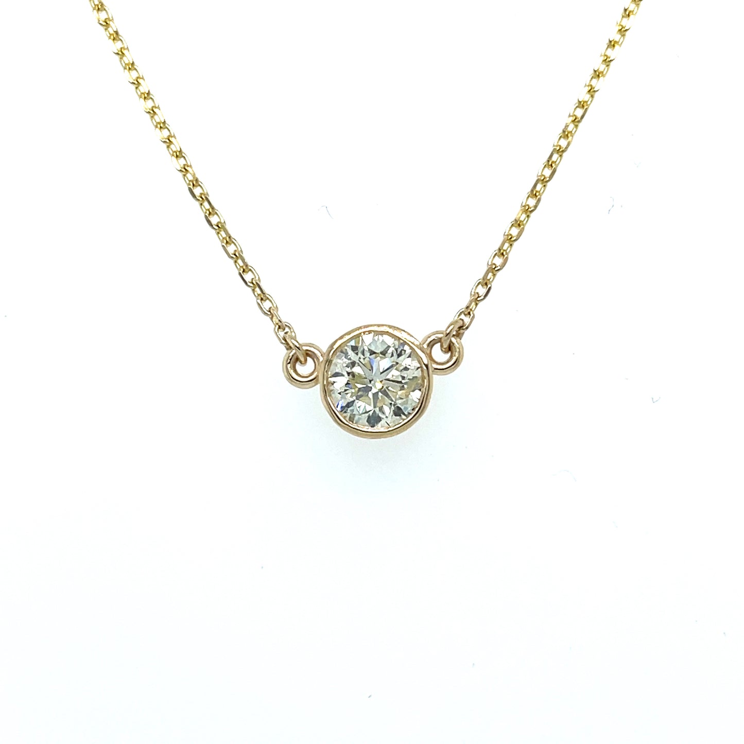 0.82 CT Round Brilliant Cut Diamonds in a 14 KT Yellow Gold Pendant